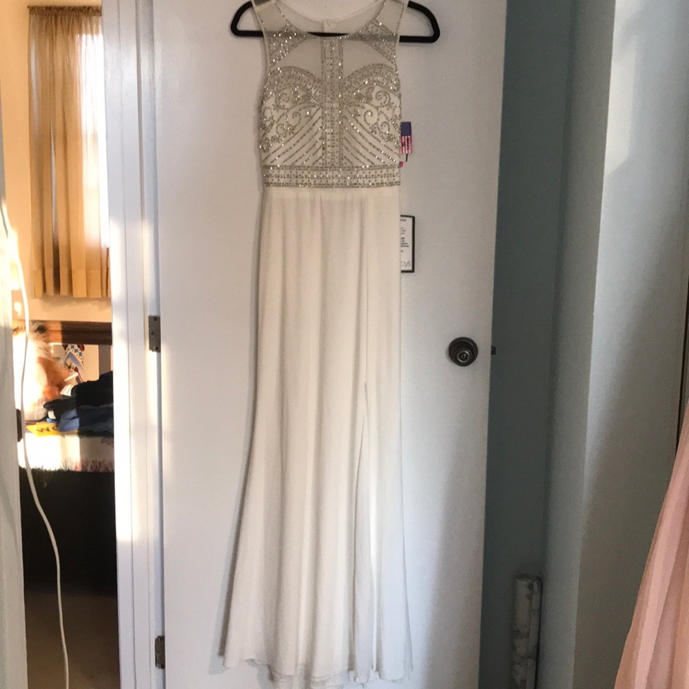 White prom dress with beaded top and mesh back